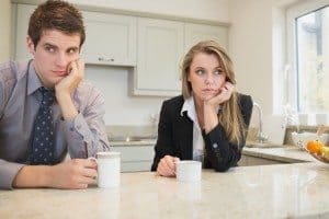 Woman and man having a dispute in kitchen