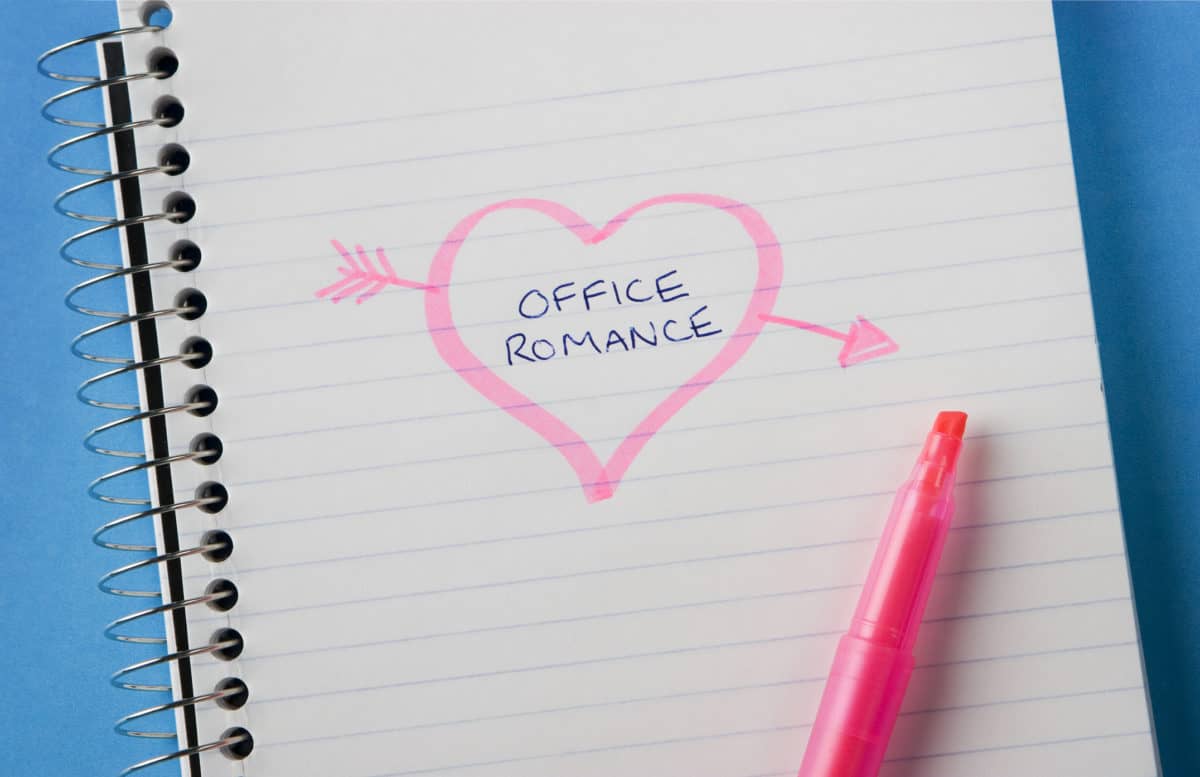 A romantic note on a coiled notebook.