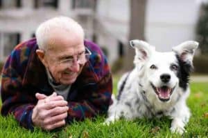 Chaser, a border collie, and her Pop-Pop, John W. Pilley